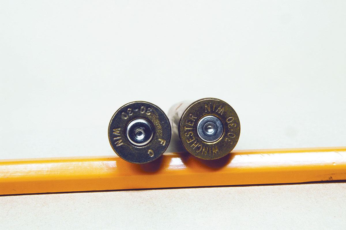 Leverguns chambered for rimmed cartridges always have generous headspace. The primer (left) protrudes .014 from the case, indicating that much headspace. The case (right) has been oiled and lubed giving us a flattened primer and false signs of pressure.